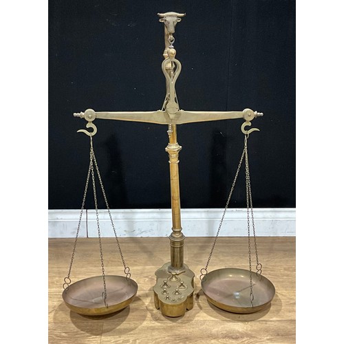 483 - A large set of brass shop counter or apothecary balance scales, marked Manua, the suspension hook ca... 