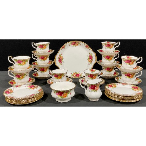 501 - A Royal Albert Old Country Roses tea service for twelve, comprising cake plate, side plates, cream j... 