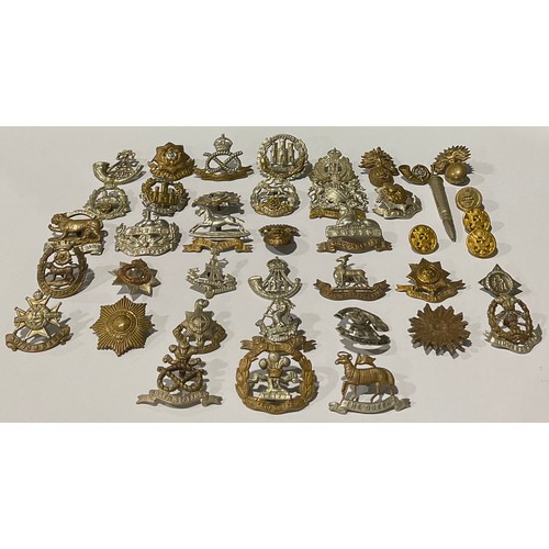 502 - A large collection of WW1/WW2 British military cap badges, however all have had the sliders and lugs... 