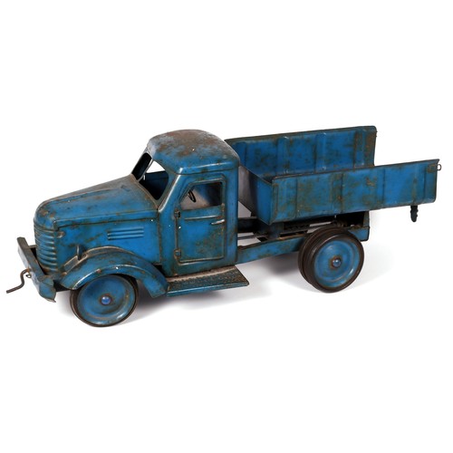 528 - A large Continental tin toy, in the form of a tipping wagon, probably manufactured by JRD Toys (Fran... 