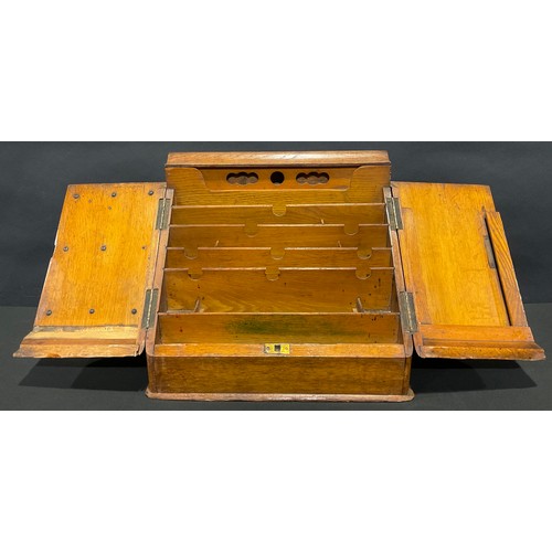 551 - A large Victorian oak slope front desk top stationery box, c.1890