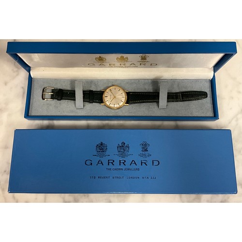 1004 - Garrard's - a 9ct gold cased presentation wristwatch, silver dial, block baton markers, minute track... 