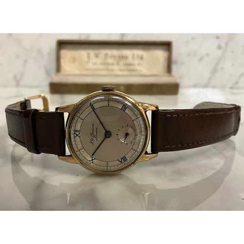 1005 - A 1950s J W Benson 9ct gold cased wristwatch, 30mm diameter case, polished and brushed silver dial, ... 