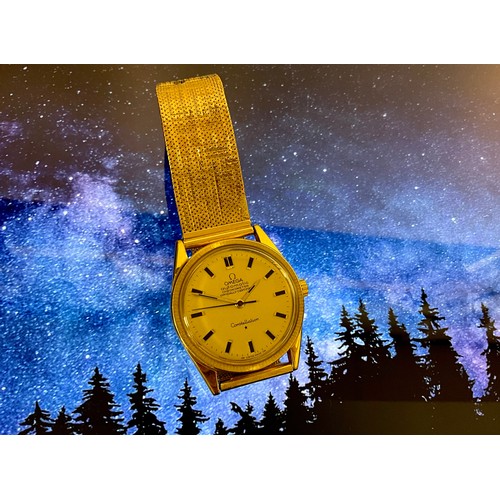 1006 - Omega - an 18ct gold Constellation chronometer wristwatch, gold coloured dial, baton hour markers, c... 