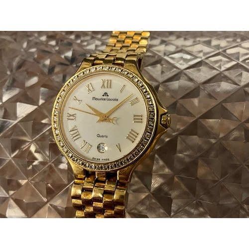 1023 - Maurice Lacroix - a lady's ZLC 18ct gold cased bracelet wristwatch, white dial, raised Roman numeral... 