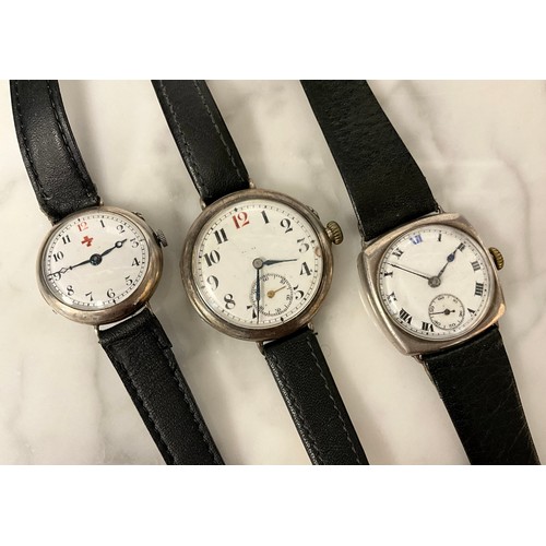 1028 - A silver cased wristwatch, white enamel dial, black Arabic numerals with red 12 position, minute tra... 