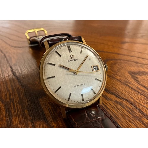 1033 - Omega - a 9ct gold cased Geneve 1061 wristwatch, stripped textured dial, block baton markers, date a... 