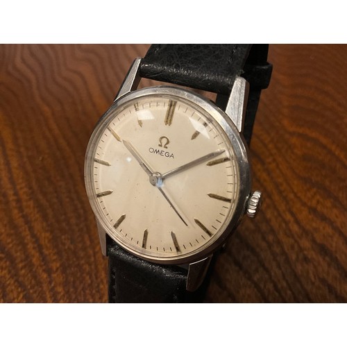 1034 - Omega - a 1960s stainless steel wristwatch, ref 131.001, 32mm case, cream dial, silver block baton m... 