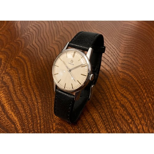 1034 - Omega - a 1960s stainless steel wristwatch, ref 131.001, 32mm case, cream dial, silver block baton m... 