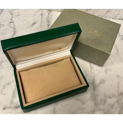 1041 - Rolex - a green watch box and outer card slip case, the inner box with Rolex and Crown marks in gilt... 