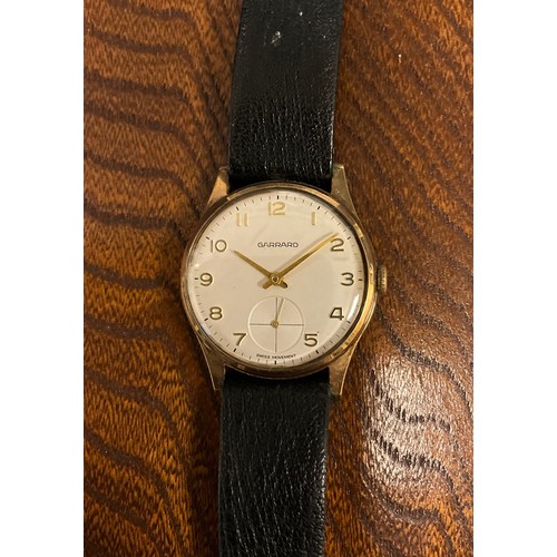 1042 - Garrard - a 9ct gold cased wristwatch, silvered dial, raised Arabic numerals, subsidiary seconds, ma... 