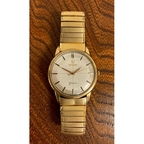 1044 - Omega  - a Geneve 9ct gold cased wristwatch, 34mm diameter case, silver target dial, block baton mar... 