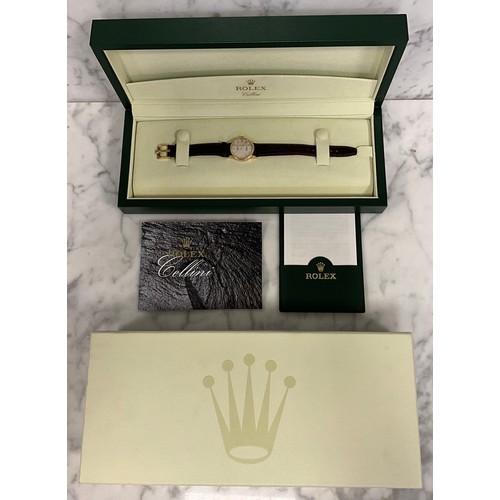 1050 - A lady's 18ct gold Rolex Cellini wristwatch, the Champagne dial with Roman numerals, winder with cro... 