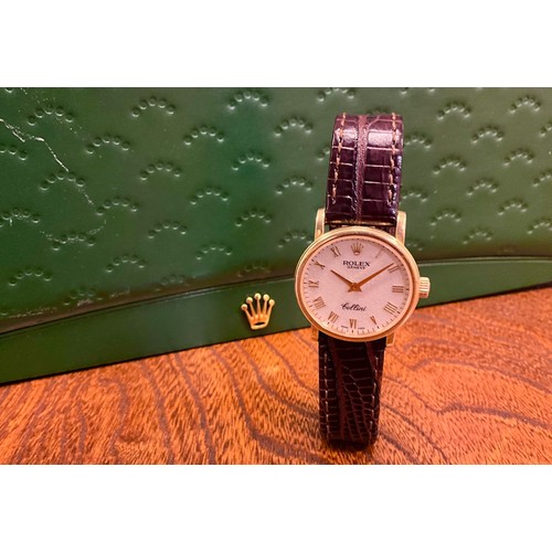 1050 - A lady's 18ct gold Rolex Cellini wristwatch, the Champagne dial with Roman numerals, winder with cro... 