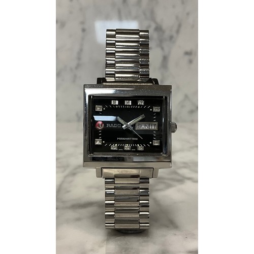 1059 - Rado - a Manhattan automatic wristwatch, stainless steel case, rectangular Tv case, black dial, rais... 