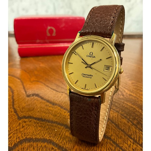 1100 - Omega - a gold plated and stainless steel Seamaster quartz date wrist watch, reference 396.0969, uns... 