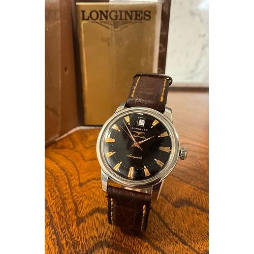 1103 - Longines - a Conquest automatic stainless steel cased wristwatch, 35mm diameter case, black dial, co... 