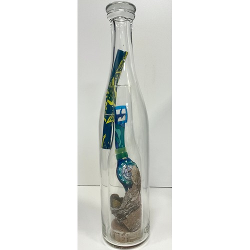 1121 - Swatch - GG118 Yuri Rocket (USA);  SDN110 Pacific Beach bottle in a bottle special packaging;  GZS02... 