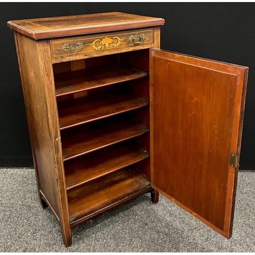 57 - An Edwardian inlaid walnut music cabinet, single drawer to frieze, above a single door with bevelled... 