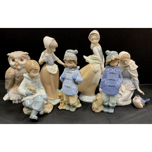 62 - Nao by Lladro including; owl, boy with rabbit, girl with butterfly; etc (8)