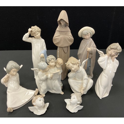 74 - LLadro & Nao figures - Cherubs, Angels, Monk, wall masks, Awakenings etc (9)