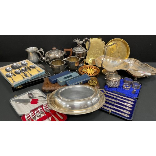 111 - Plated ware including; a three piece tea set, chocolate pot, entree dish and lid, silver handle kniv... 