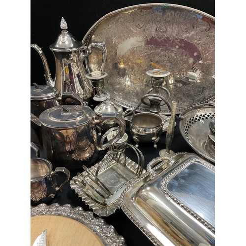 123 - A silverplated Art Deco Gladwin plate Embassy ware four piece tea set;  another three piece;  oval g... 