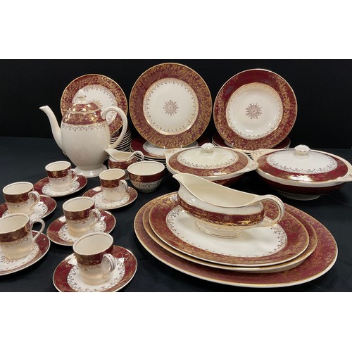 127 - A JEG Meakin red and gilt border dinner service for six including: three graduated meat dishes, grav... 