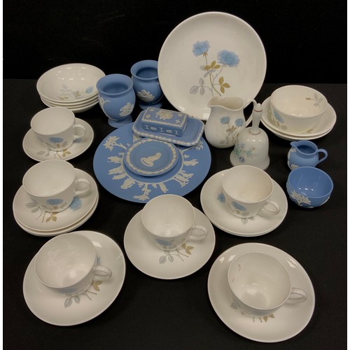 129 - A Wedgwood 'Ice Rose' tea set for six comprising; six tea cups and saucers, a milk jug, sugar bowl, ... 