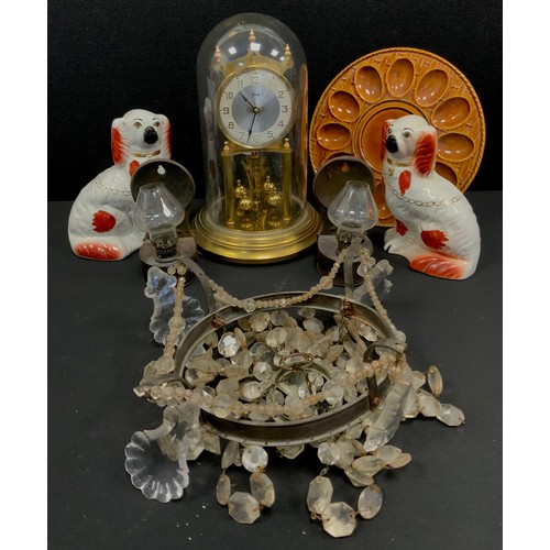 136 - A Kundo 400 day clock,  pair of staffordshire Spaniels, pair of small wall mounting wall lamps, poss... 