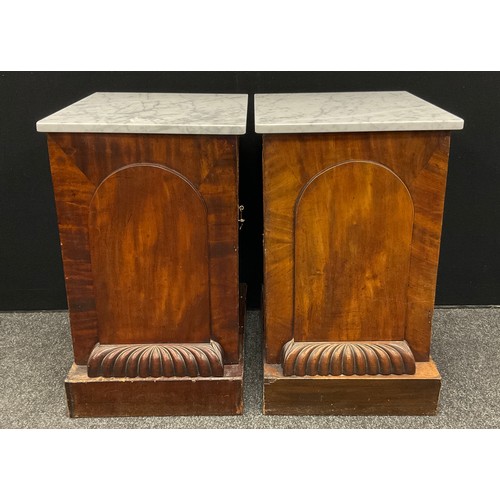 153 - A Pair of Victorian mahogany side or bedside cabinets,  Carrara Marble tops, above a single arch-top... 