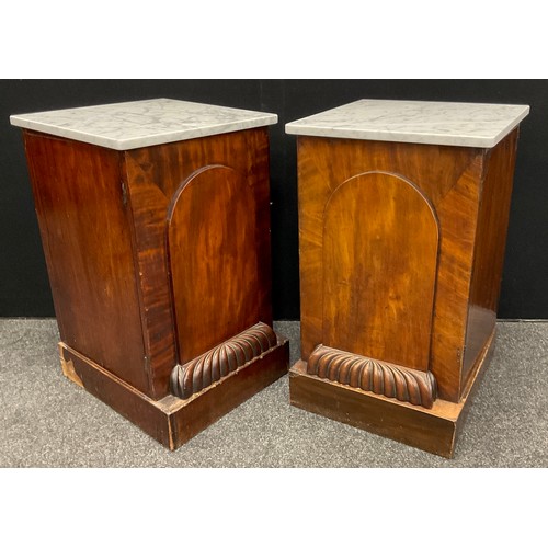 153 - A Pair of Victorian mahogany side or bedside cabinets,  Carrara Marble tops, above a single arch-top... 