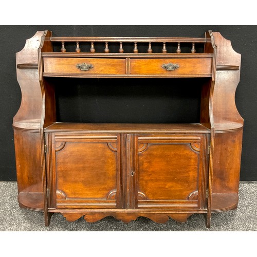 156 - An edwardian mahogany wall hanging cabinet, galleried shelf above recess and pair of cupboard doors,... 