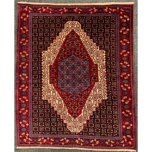 98 - A North West Persian Senneh rug, 150cm x 123cm.