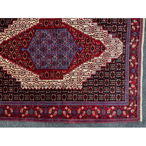 98 - A North West Persian Senneh rug, 150cm x 123cm.