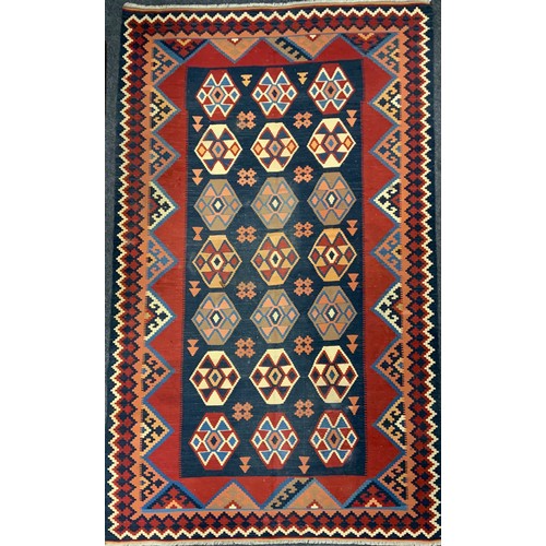 105 - A South West Persian Qashgai Kilim rug / carpet, 290cm x 173cm.