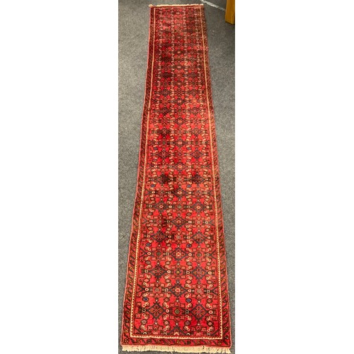 177 - A North West Persian Malayer runner, hand-knotted in rich red, with blue, and white, 370cm x 63cm.