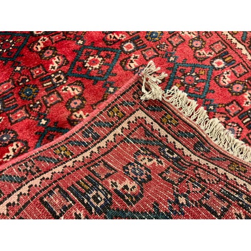 177 - A North West Persian Malayer runner, hand-knotted in rich red, with blue, and white, 370cm x 63cm.