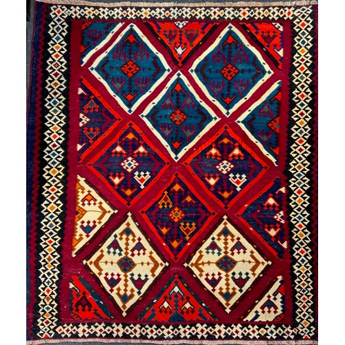 188 - A South-west Persian Qashgai Kilim rug, 220cm x 190cm.