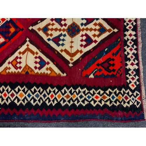 188 - A South-west Persian Qashgai Kilim rug, 220cm x 190cm.