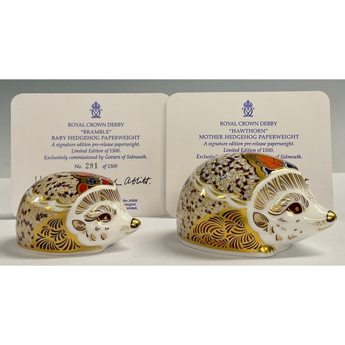 7 - A pair of Royal Crown Derby paperweights, Hawthorn Mother Hedgehog and Bramble Baby Hedgehog, Govier... 