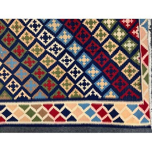 193 - A South-west Persian Qashgai Kilim rug, 275cm x 150cm.