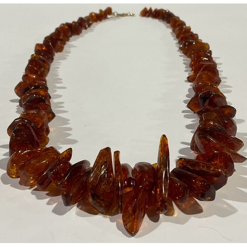 164 - ***LOT WITHDRAWN*** A Baltic amber graduated necklace, 67cm long overall