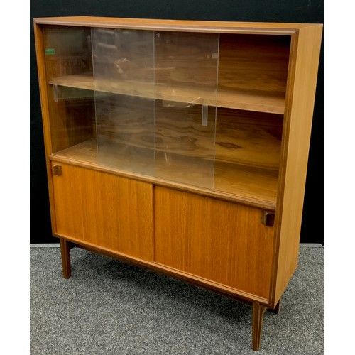 240 - A mid century design teak bookcase cabinet, by Beaver and Tapley furniture, 101.5cm high x 91.5cm wi... 