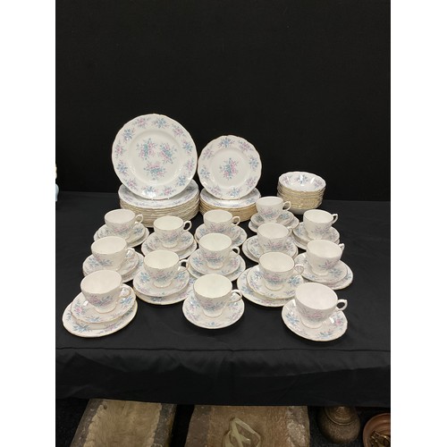 145 - A Colough muted floral pattern table service for twelve including; twelve dinner plates, twelve medi... 