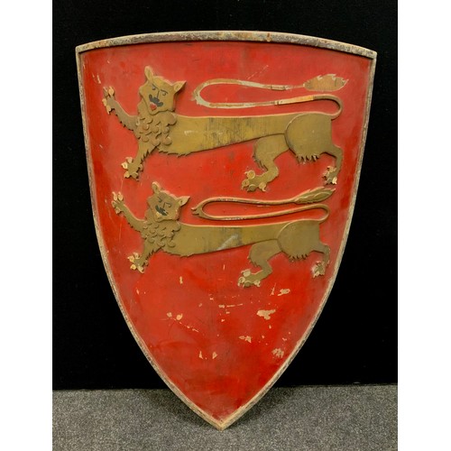 179 - A reproduction medieval shield, 108cm high.