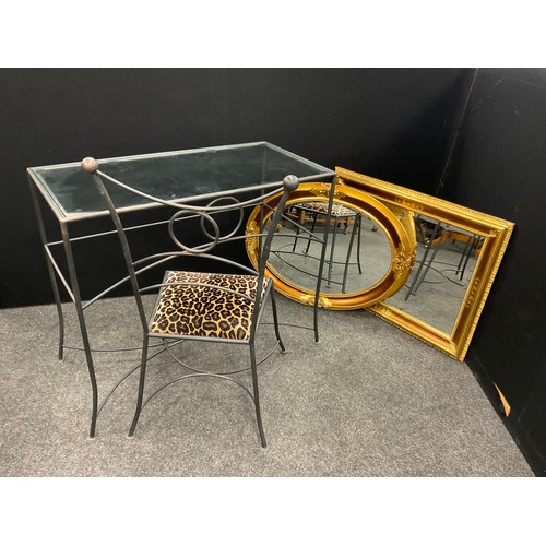 184 - A contemporary wrought iron effect glass-top dressing or console table and chair, the table measurin... 