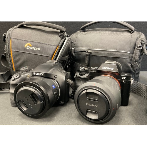 241 - Cameras - Two Sony digital cameras inc alpha 7, 28-70mm lens, serial number 4052255;  Exmor R Cybers... 