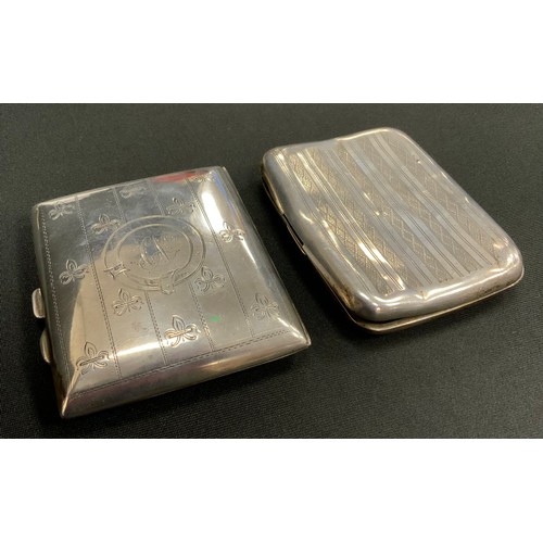 289 - An Edwardian silver cigarette case, Birmingham 1910; another 1926, 5ozt (2)