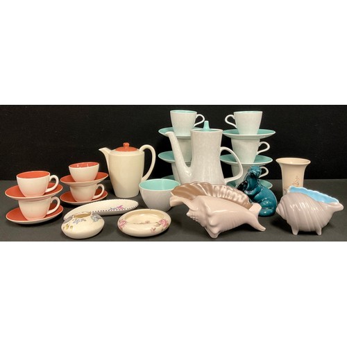 51 - A Poole pebble two tone coffee pot, cups and saucers, another part set similar in grey and red; a Po... 